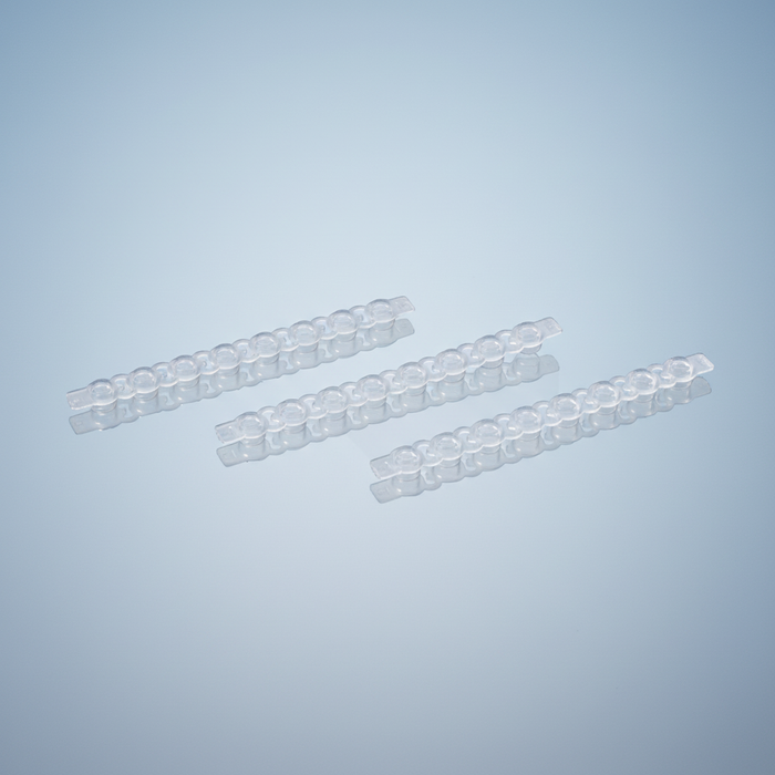 NEST Flat PCR Cap Strips — three 8-cap strips showing flat optical surfaces for qPCR